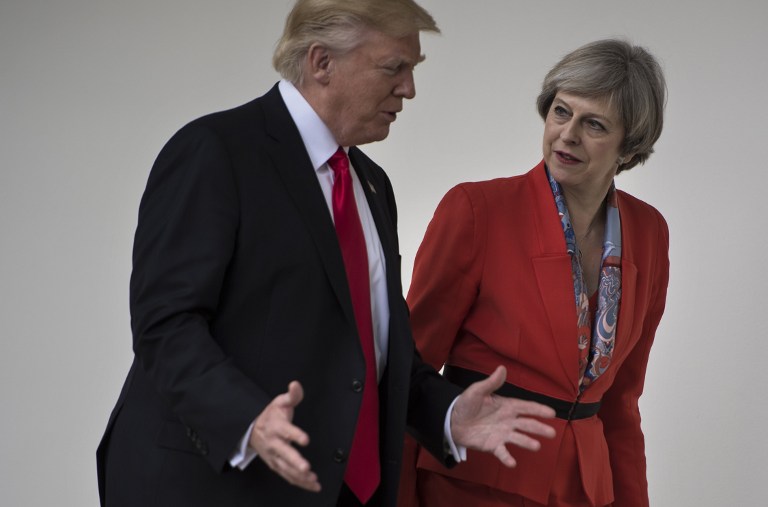 'DEEP BOND.' US President Donald Trump and British Prime Minister Theresa May walk at the White House on January 27, 2017 in Washington, DC. Photo by Brendan Smialowski/AFP 