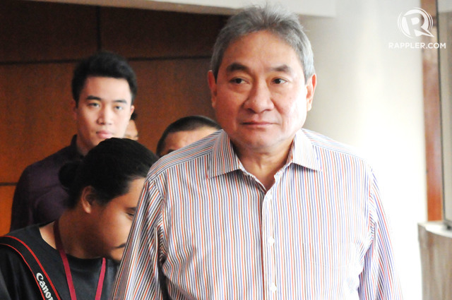 MIGHTY. Mighty Corporation president Alex Wongchuking arrives with former NBI deputy director Reynaldo Esmeralda at the NBI headquarters on March 7, 2017. Photo by Ben Nabong/Rappler