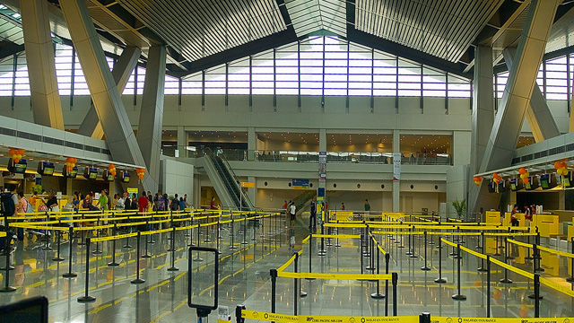 LONG BATTLE. The NAIA 3 contract was awarded to Piatco in 1997 during the Ramos administration; but it was declared irregular by the Arroyo government in 2002, due to allegations that the consortium violated the Anti-Dummy Law. Photo by Carabaopower on Wikimedia Commons  