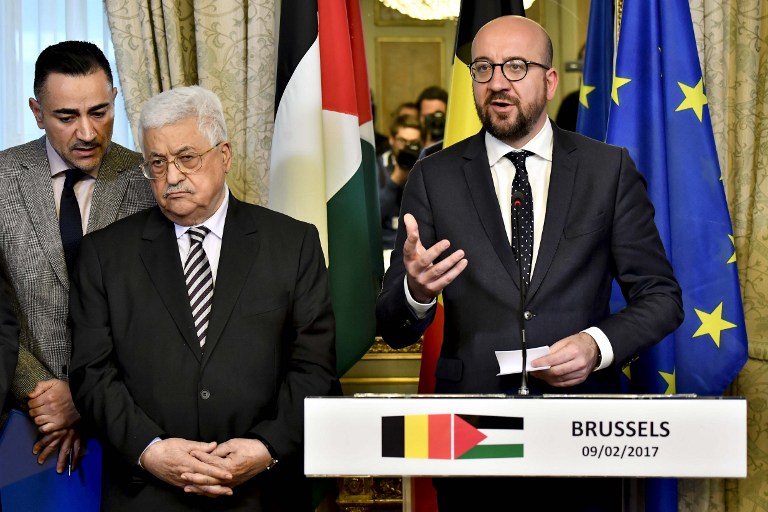 CHARLES MICHEL. Palestinian President Mahmoud Abbas (L) and Belgian Prime Minister Charles Michel (C) give a press conference in Brussels on February 9, 2017. Photo by Dirk Waem / BELGA / AFP 